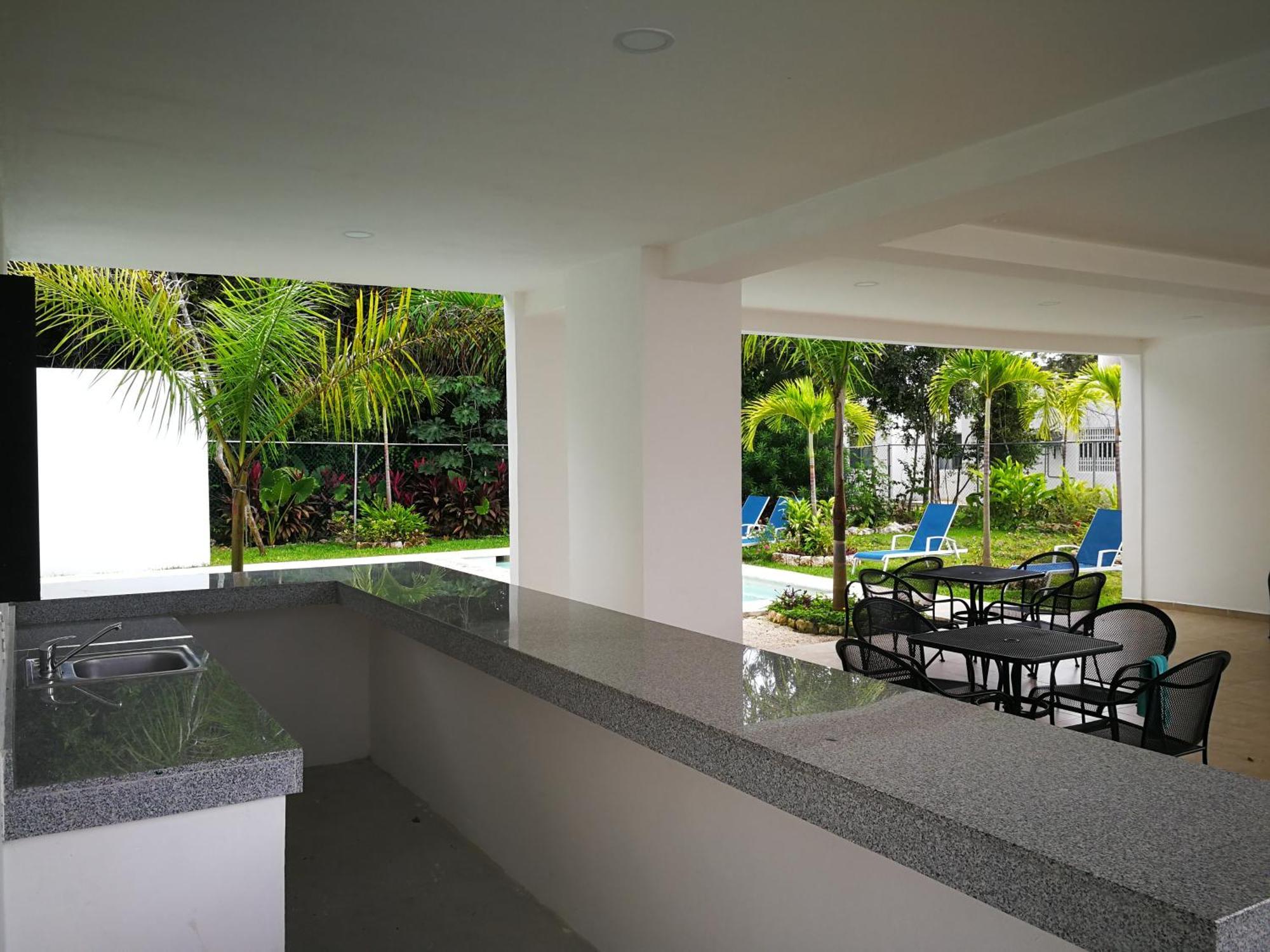 El Faro Residencial Villa ปัวร์โตโมเรลอส ภายนอก รูปภาพ